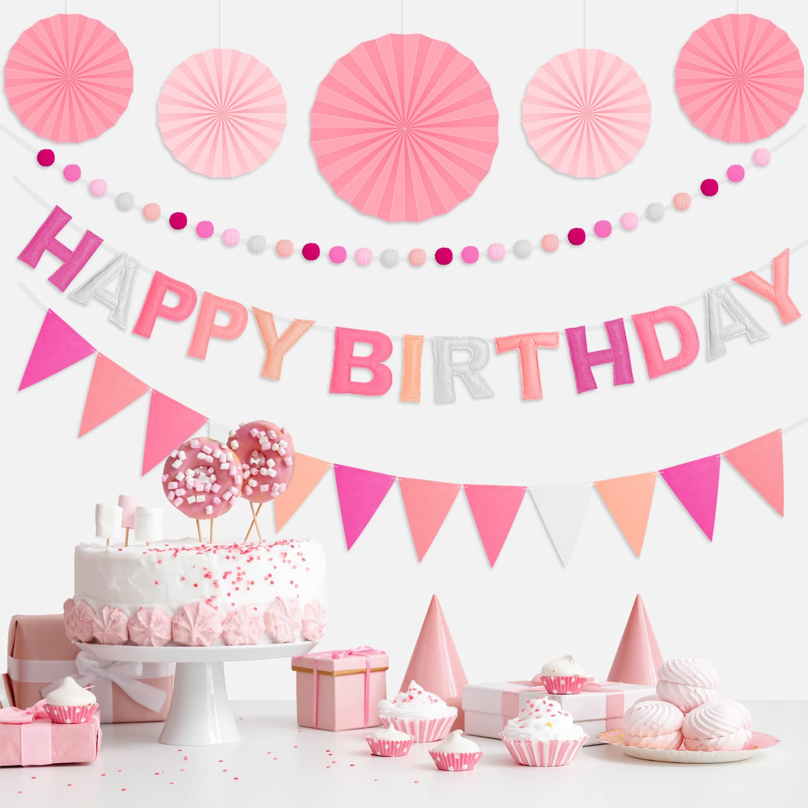 Danadia pink felt pom-poms add soft color and texture to any party display.