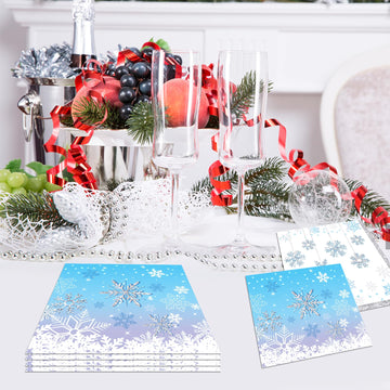 Closeup of blue snowflake napkin design by Darneidra for coordinated tables