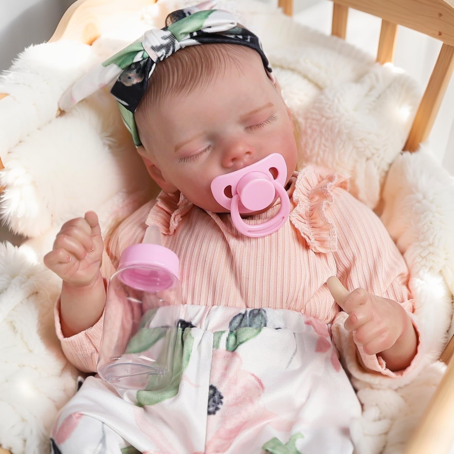 DAYOFF KIDS 18-inch weighted vinyl doll is easy to hold and pose.