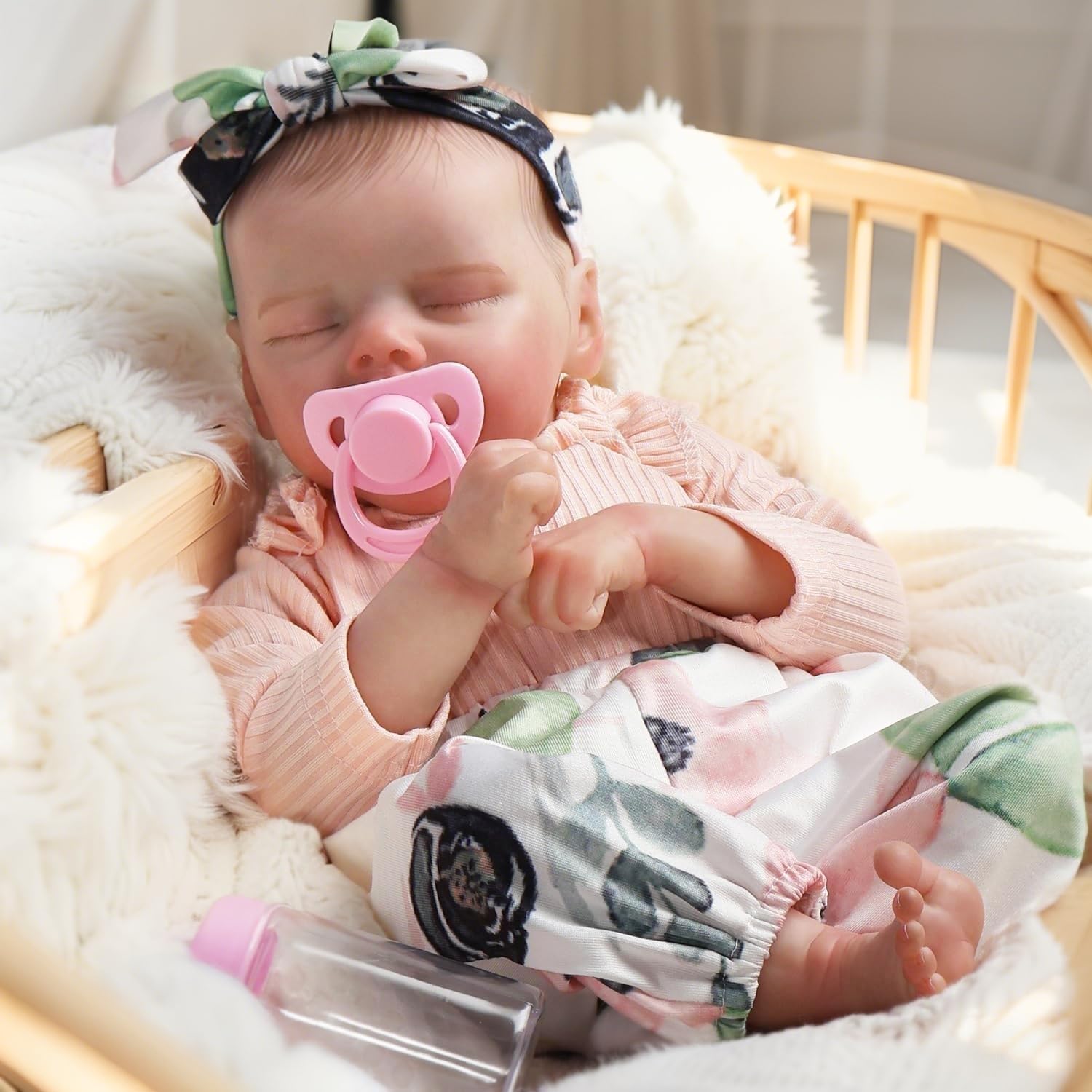 DAYOFF KIDS lifelike reborn doll sleeping face for soothing imaginative play.