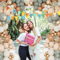 DBKL balloon arch with brown and sage tones enhances baby showers