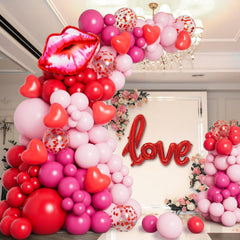 DBKL pink and red balloons create a vibrant romantic backdrop for photos.
