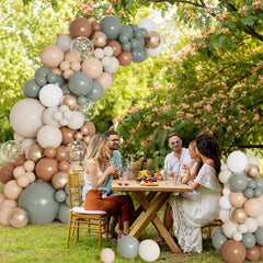 DBKL sage green neutral balloons closeup highlighting contemporary backdrop