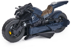 DC Comics Batman figure on Batcycle for cinematic battle vibes.