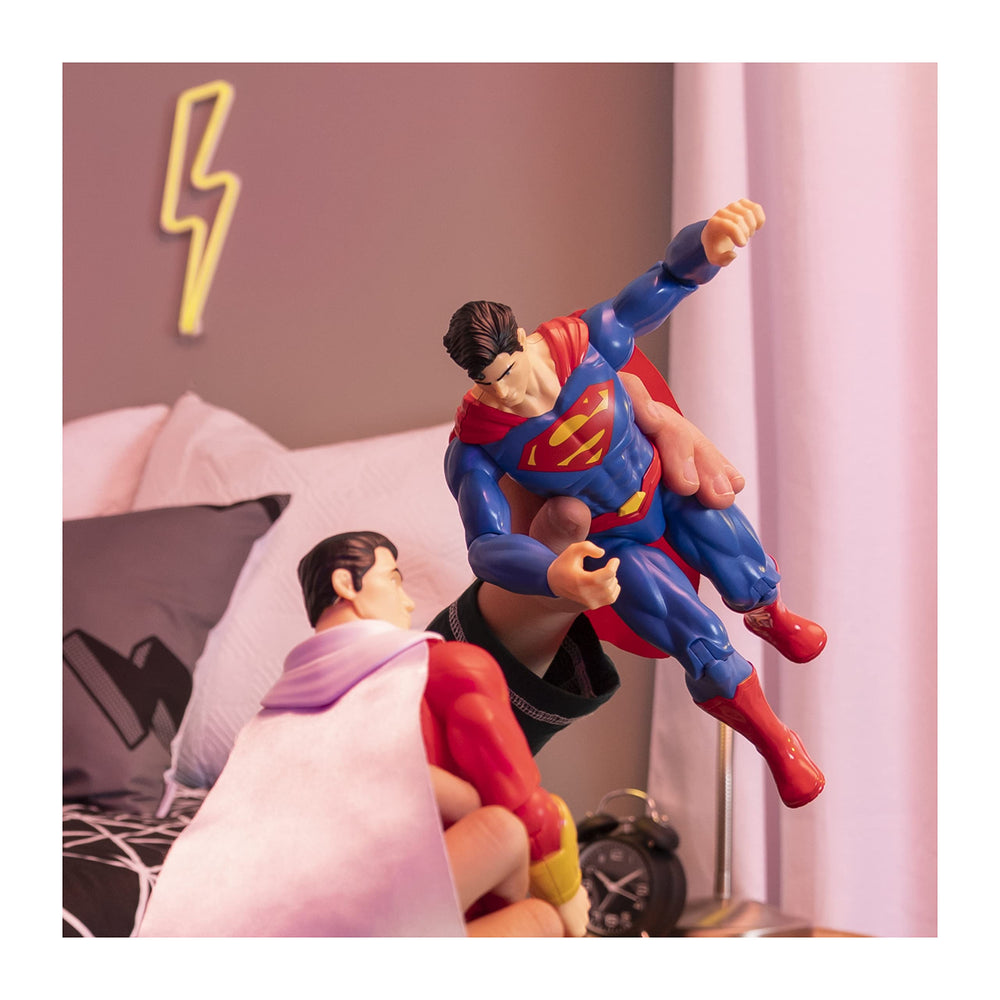 DC Comics Superman figure shows cloth cape detail for authentic superhero styling.