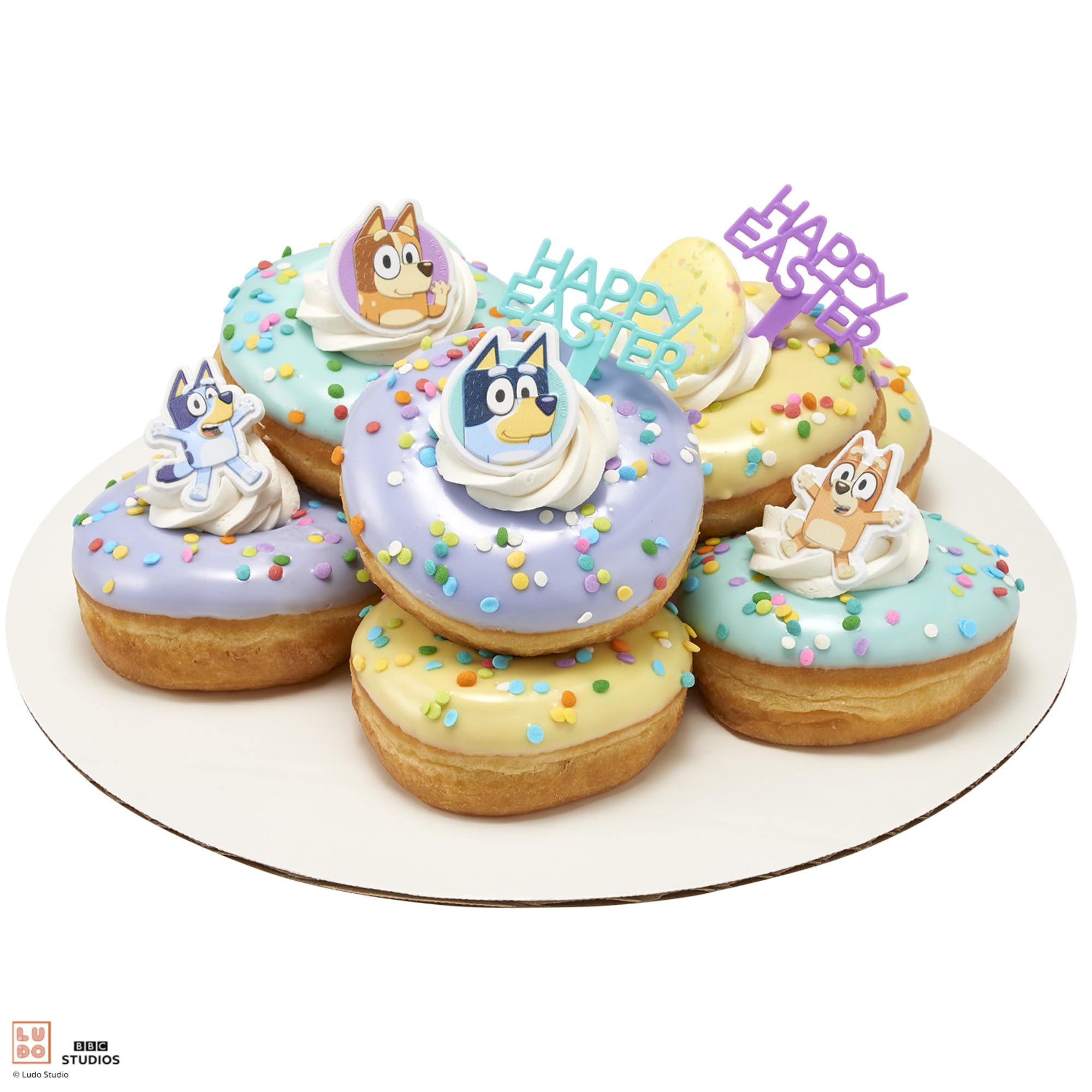 DecoPac Bluey rings cupcake toppers arrangement for party table.