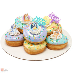 DecoPac Bluey rings cupcake toppers arrangement for party table.