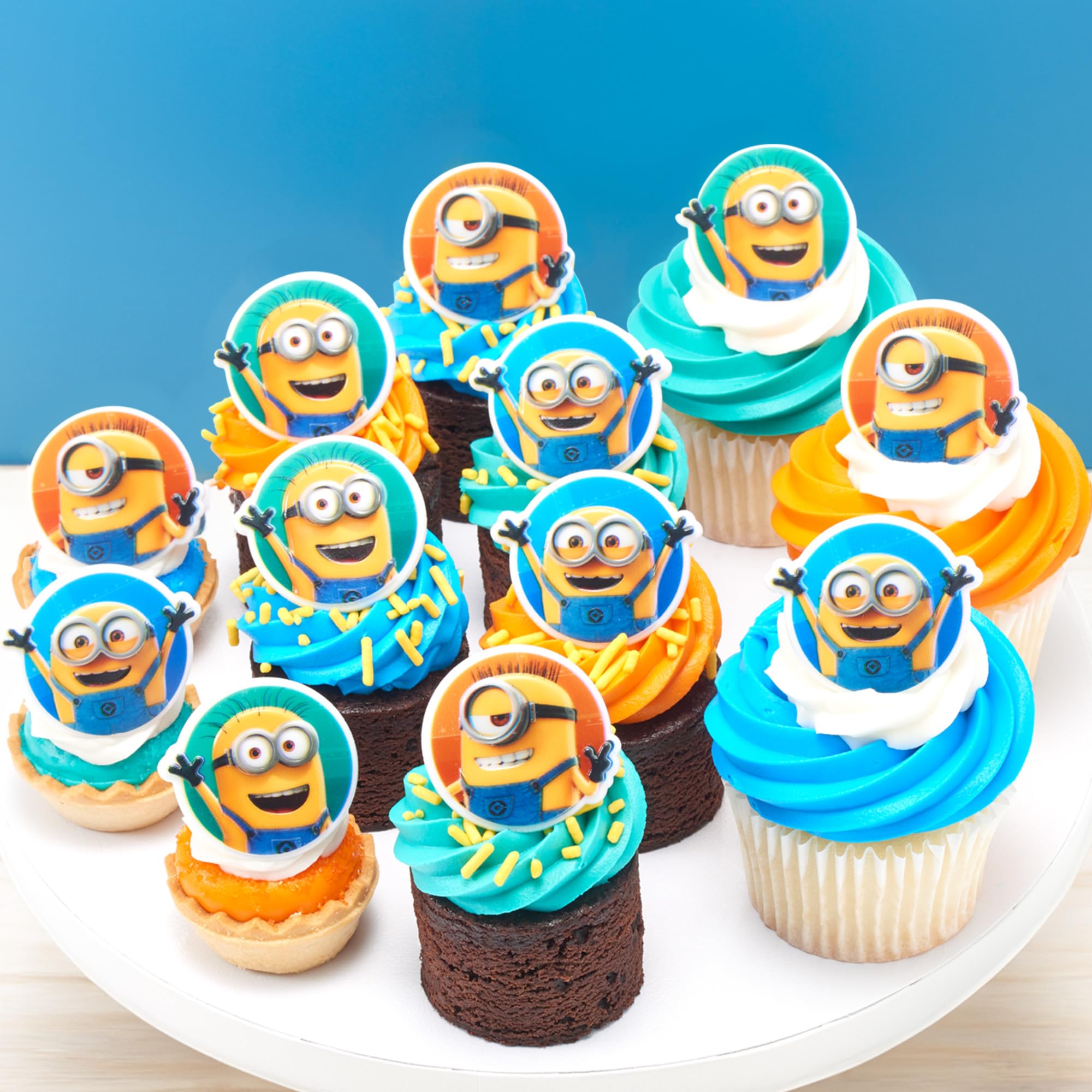 DecoPac Minions cupcake rings show three colorful designs for versatile decorating.