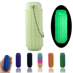 Deiviko Little Ouchies pendant with roller spikes for portable tactile relief.