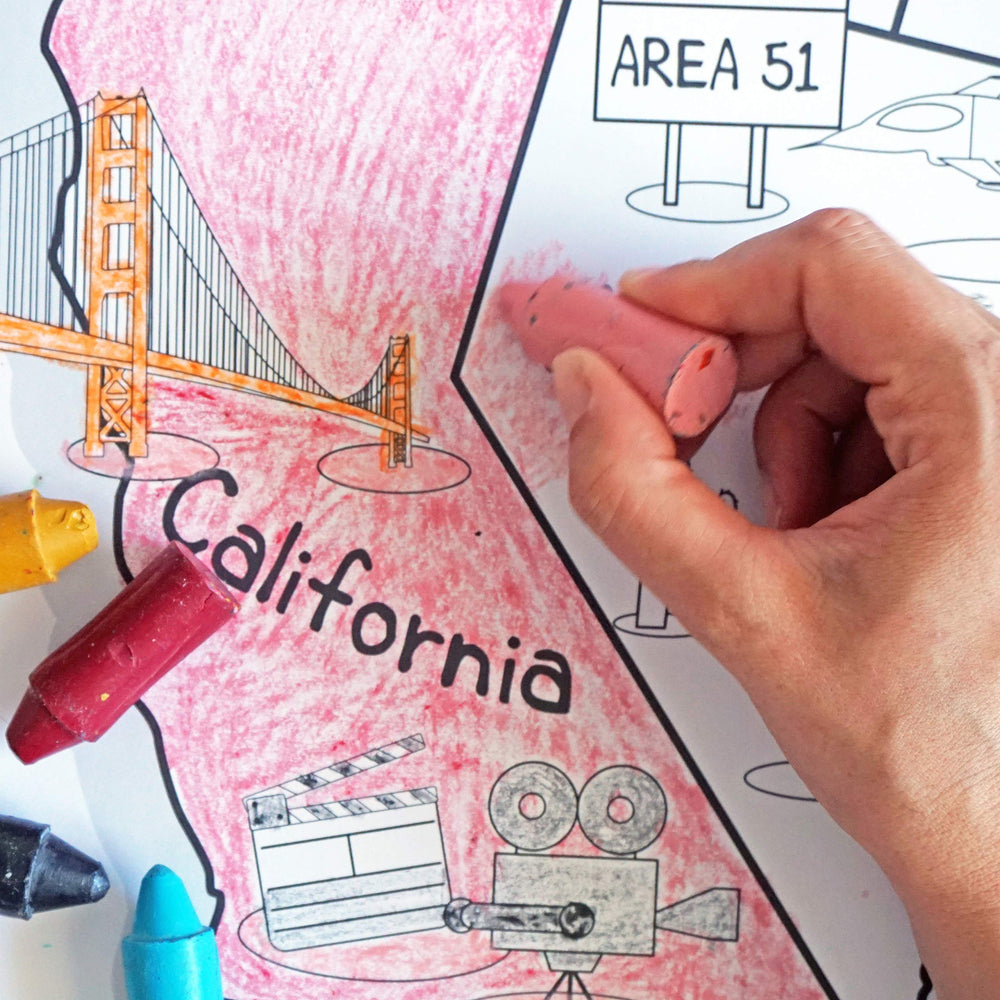 Dekali Designs US map poster folded for easy storage and transport.