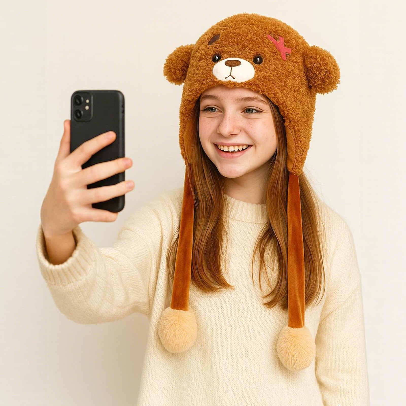 Deletoys Highland cow plush hat with animated ears.