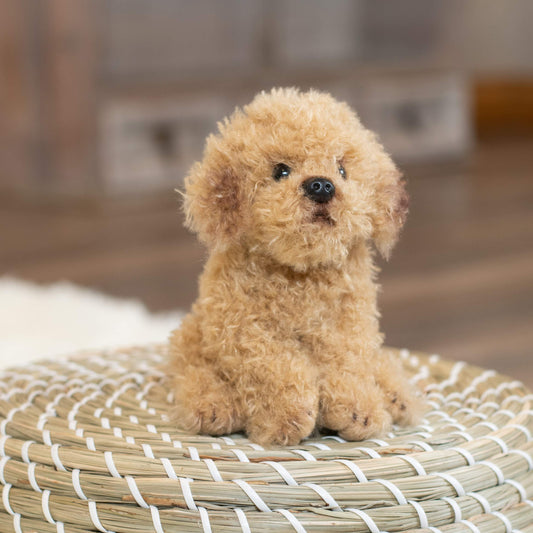 Close-up of DEMDACO Labradoodle plush fur texture for gentle play.