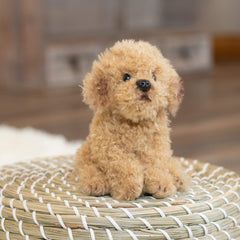 Close-up of DEMDACO Labradoodle plush fur texture for gentle play.