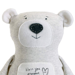 DEMDACO Plush Bless You Bear fabric detail emphasizes soft texture for imaginative play