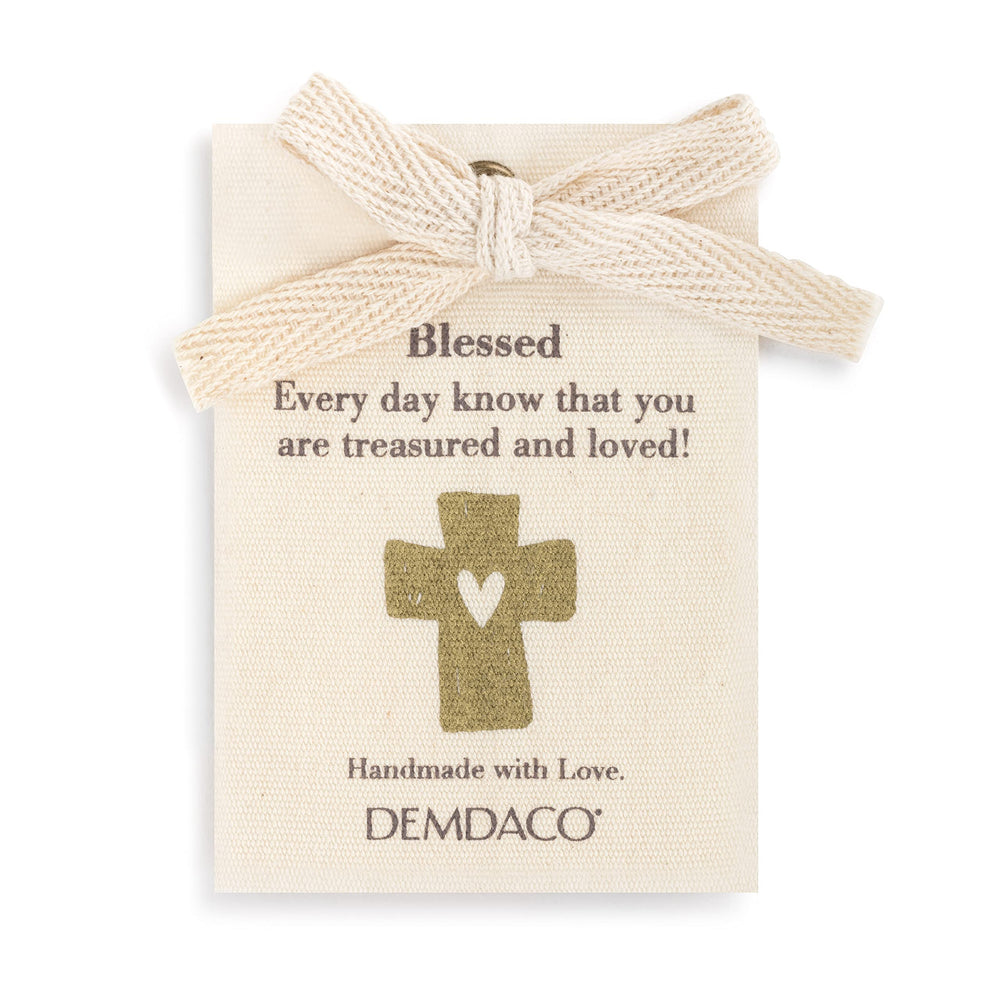 DEMDACO sewn bottom tag Giving Bear shows handmade-with-love detail.