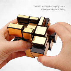 D-FantiX Shengshou Mirror Cube in hand, portable puzzle for focus.