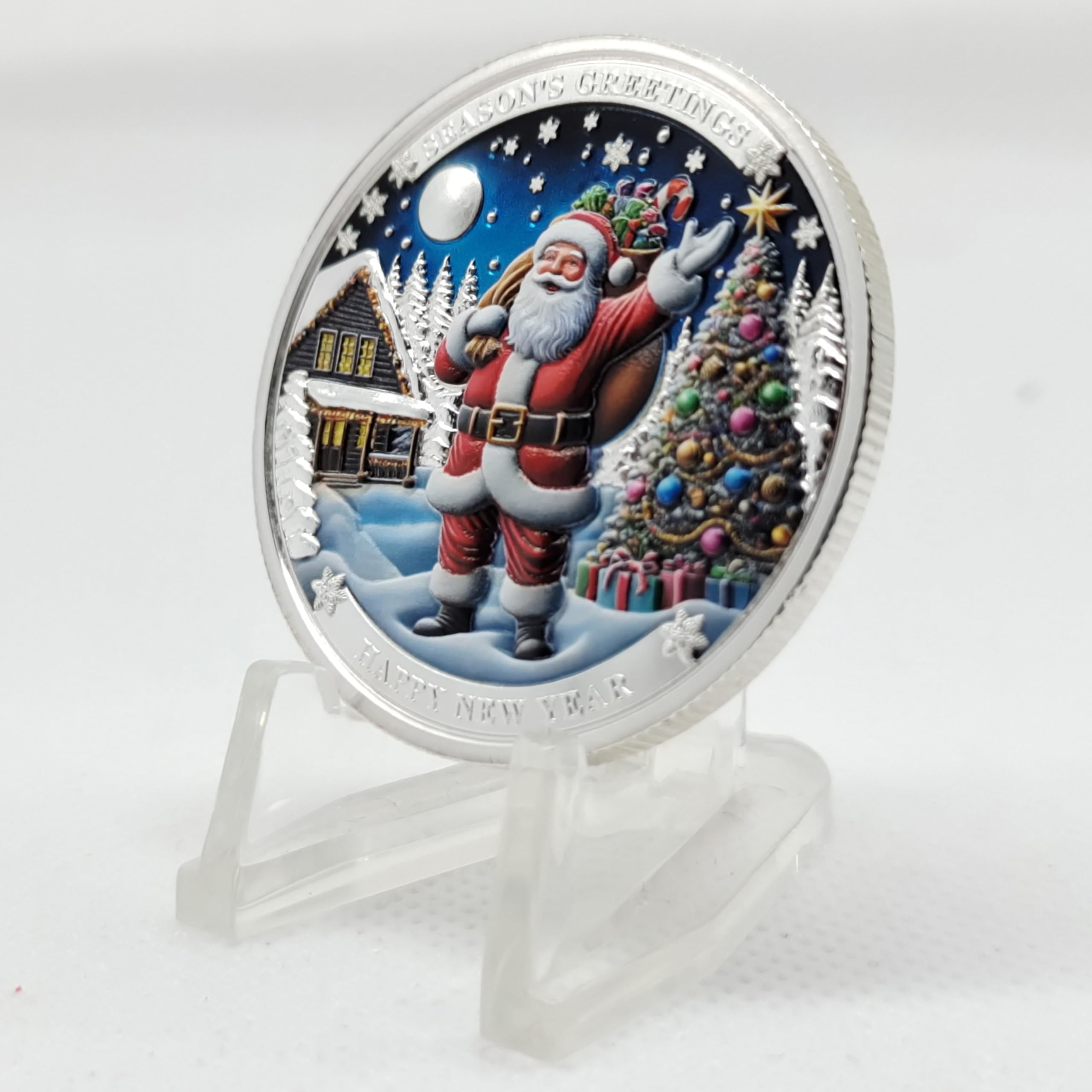 DFFDFF Enamel color painting adds vivid holiday hues to the Santa coin.