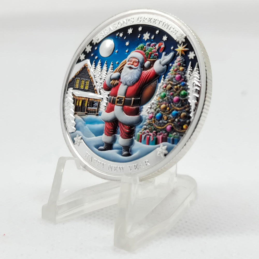 DFFDFF Enamel color painting adds vivid holiday hues to the Santa coin.