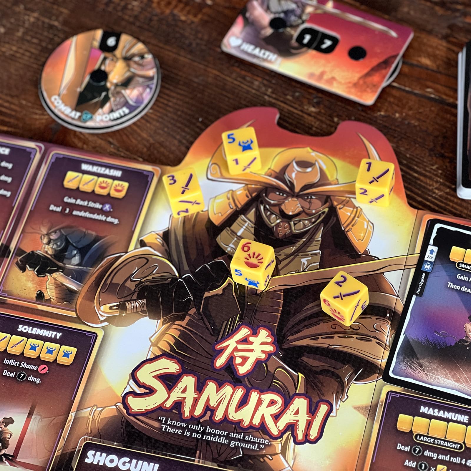 Dice Throne rulebook and tokens layout, helping quick rule lookup during matches.