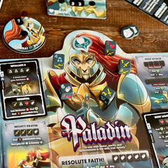 Dice Throne tokens and rulebooks provide clear play guides and reliable tracking.