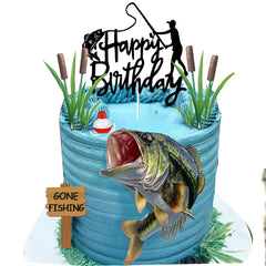 DiDida seaweed and reeds decor enhances a fishing-themed cake scene.