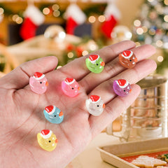 Diinokiy cute Santa-hat ducks for holiday table decor.