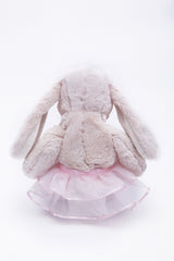 DILLY DUDU Plush Bunny with decorative bow adds a cute room touch.