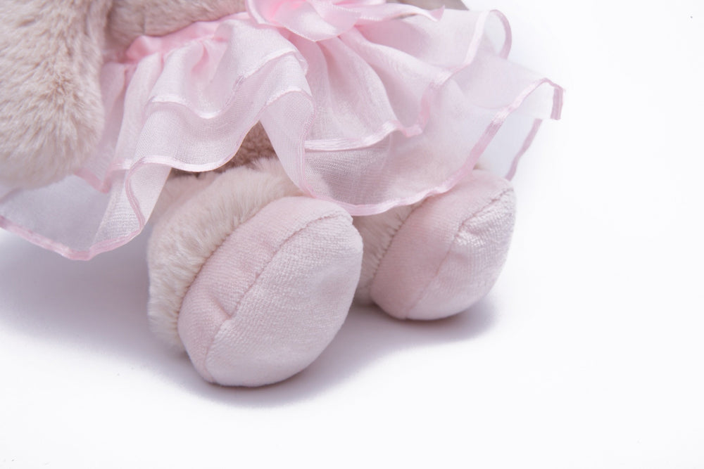 DILLY DUDU Surface washable bunny plush for quick cleanup after adventures.