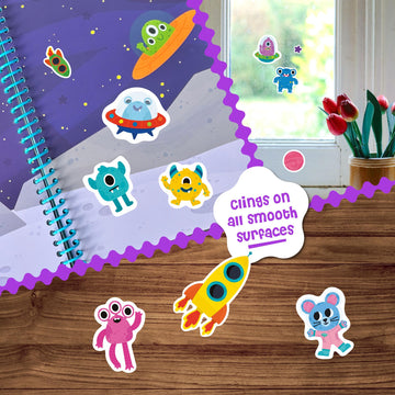 DINO MINI Stick4Ever waterproof stickers being wiped clean after mess-free play.