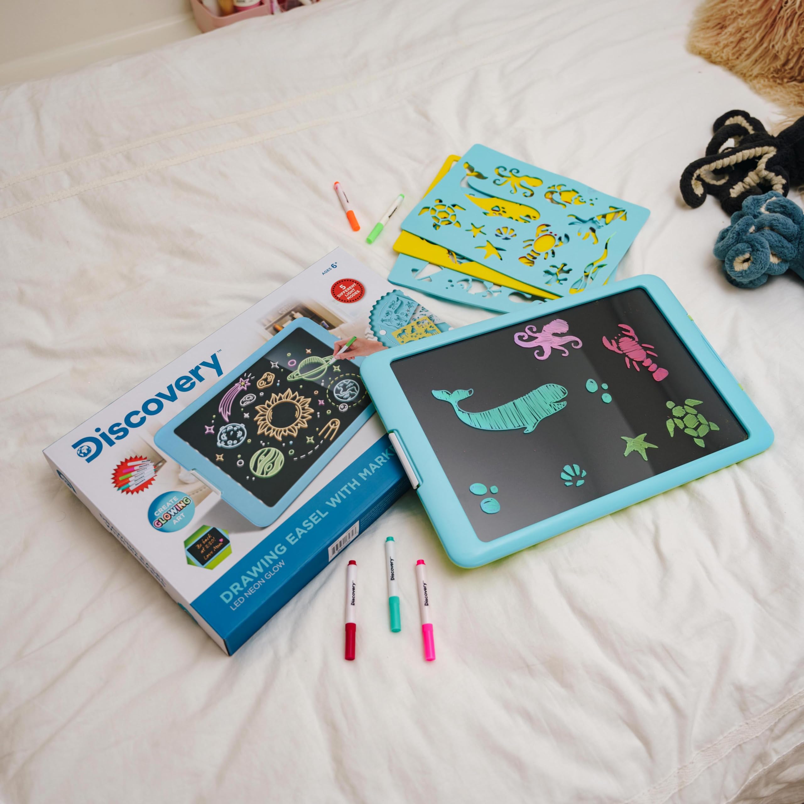 Discovery Neon Glow Drawing Easel easy-clean markers for mess-free creativity