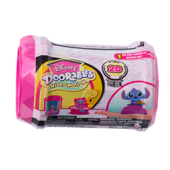 Disney Doorables animated figurine on base shows glittery eyes and stylized details.