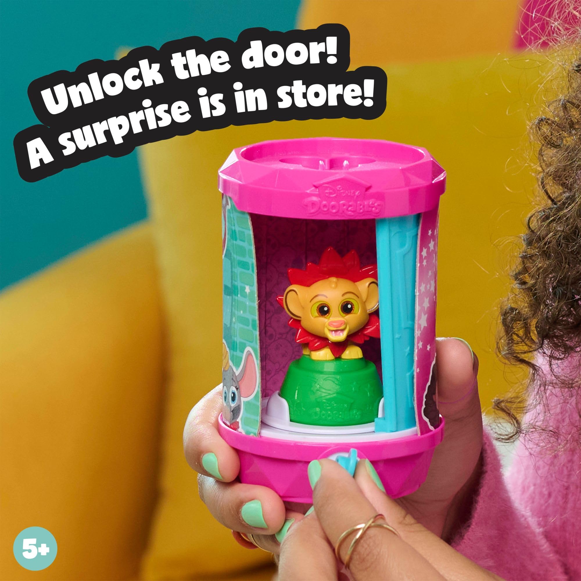 Disney Doorables figure moving on palm for tactile, interactive play.
