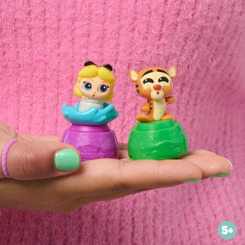 Disney Doorables gold key unlocks the door to an animated surprise.