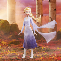 Disney Frozen Elsa doll close-up showing facial expression and hair texture.