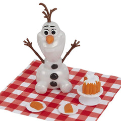 Disney Frozen picnic blanket and snacks set the scene for cozy pretend picnics