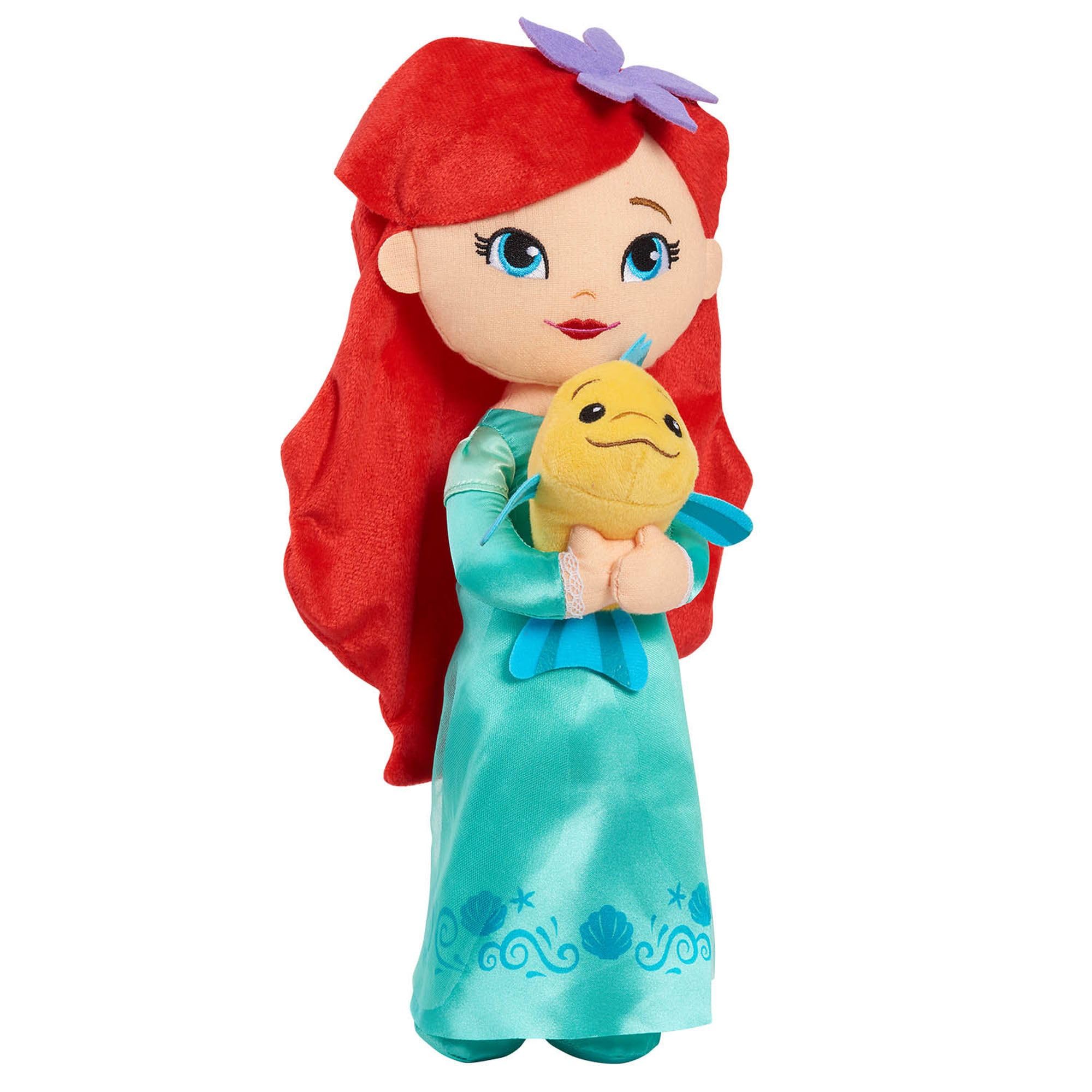 Flounder mini plush attached to Ariel encourages cooperative play.