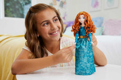 Merida doll with removable skirt showcased for interactive dress-up play.