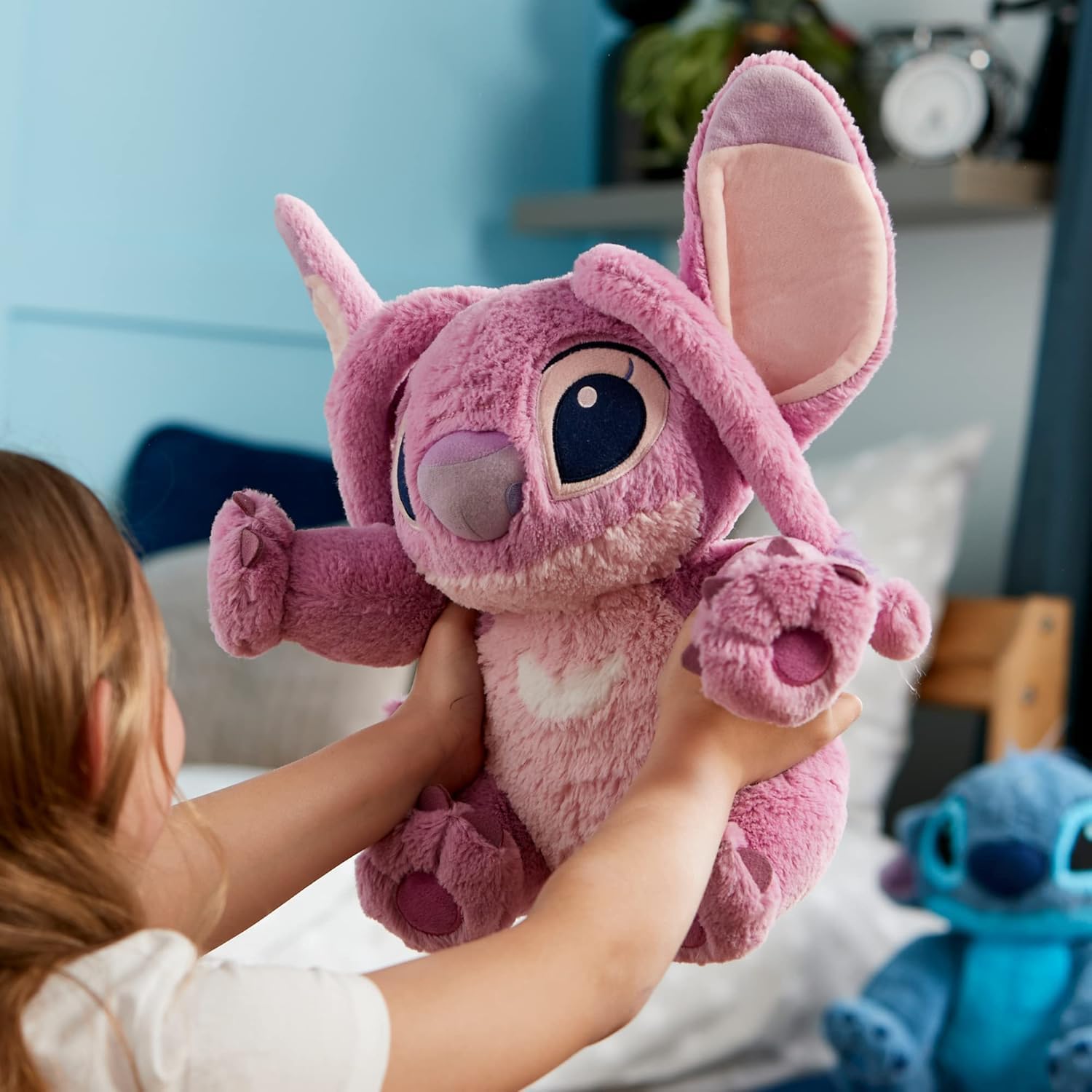 Disney Store Angel plush embroidered features enhance authentic character look.