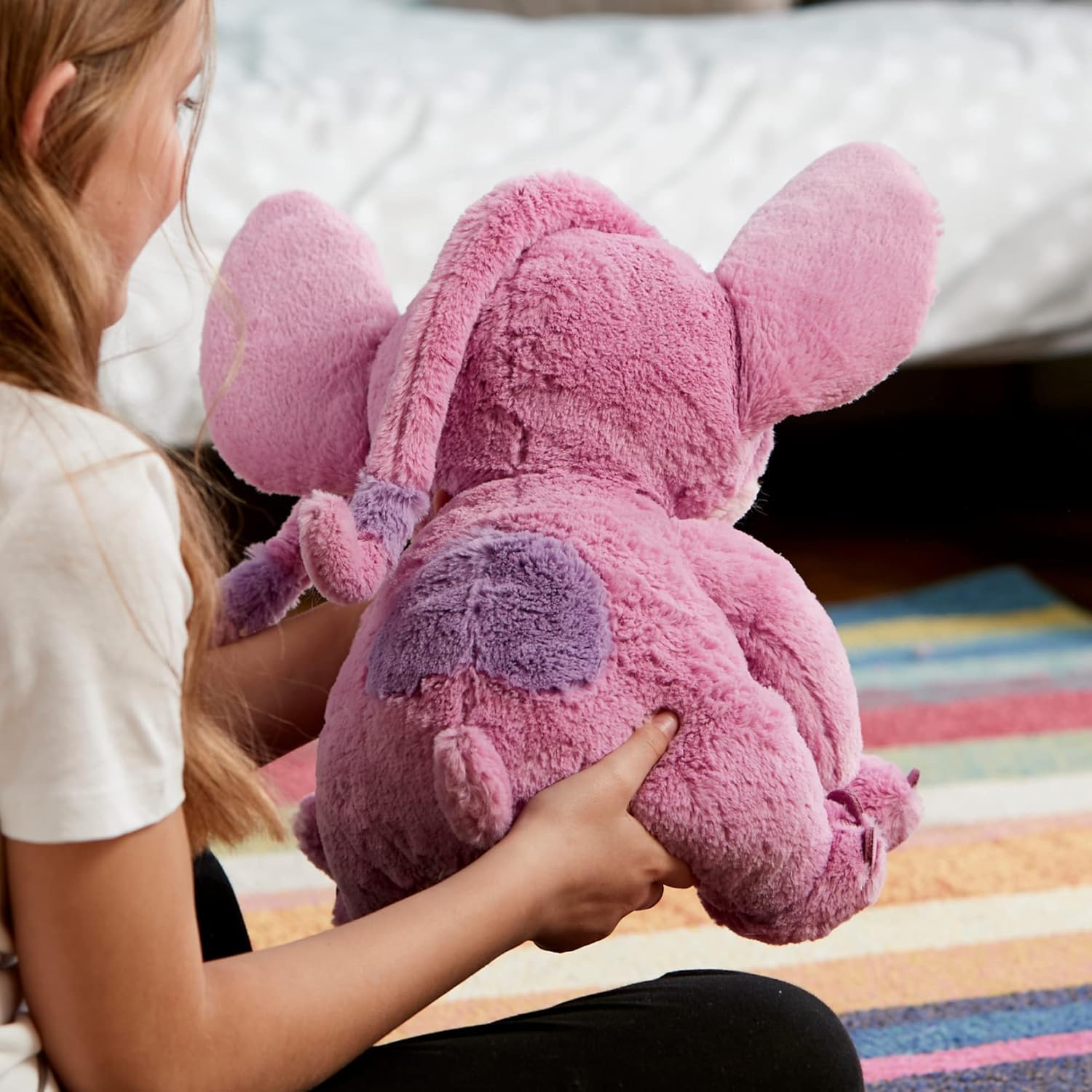 Disney Store Angel plush with felt claws for distinctive appearance.