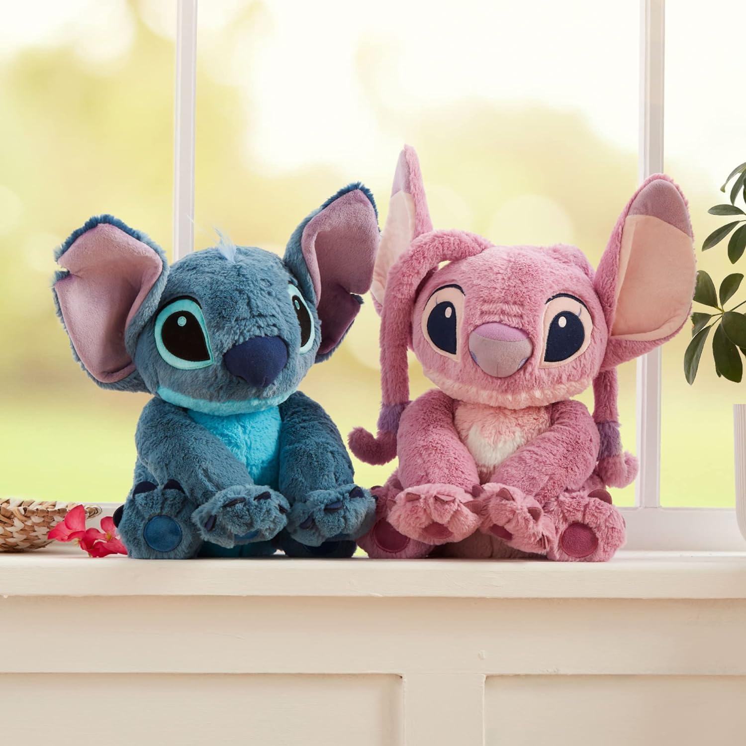 Disney Store Angel plush soft floppy ears for cuddly play.