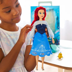 Ariel's pearlescent shoes complement the classic outfit for dress-up moments