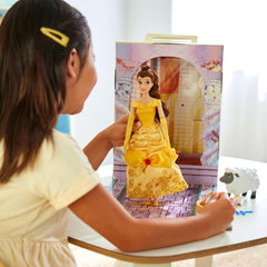 Belle wearing blue satin dress with pink apron for versatile play scenarios.