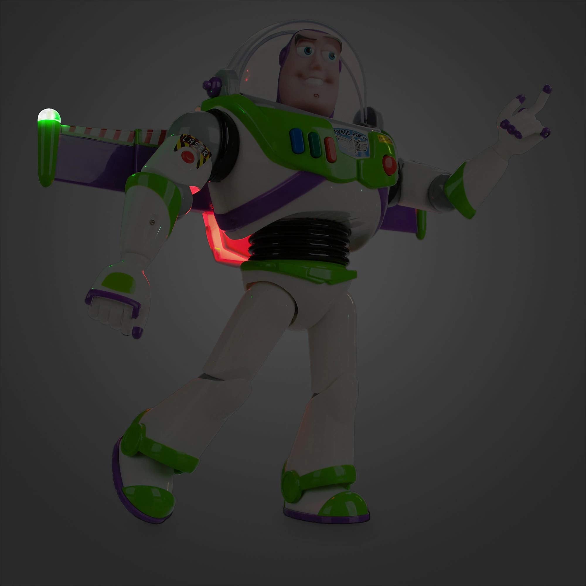 Buzz Lightyear interactive figure pressing buttons to trigger phrases during play