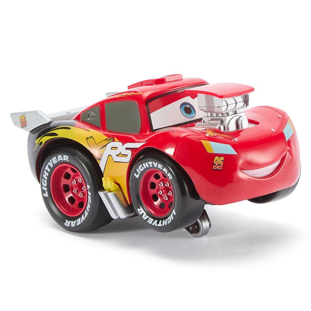 Lightning McQueen wheelie action enhances stunt style play.