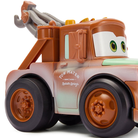 Disney Store Mater tow gear action for fast, fun replays.
