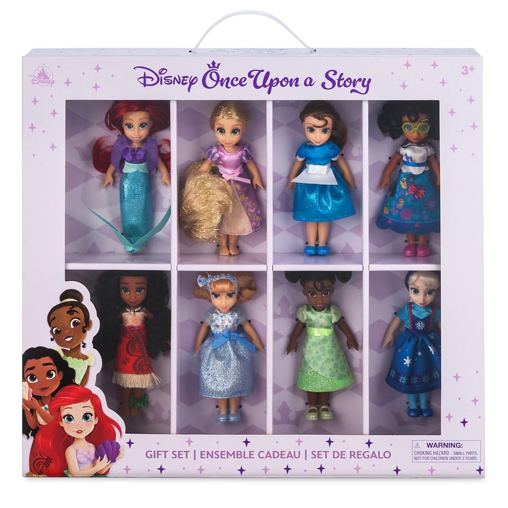 Disney Store Once Upon a Story dolls with glittery outfits for display and storytelling