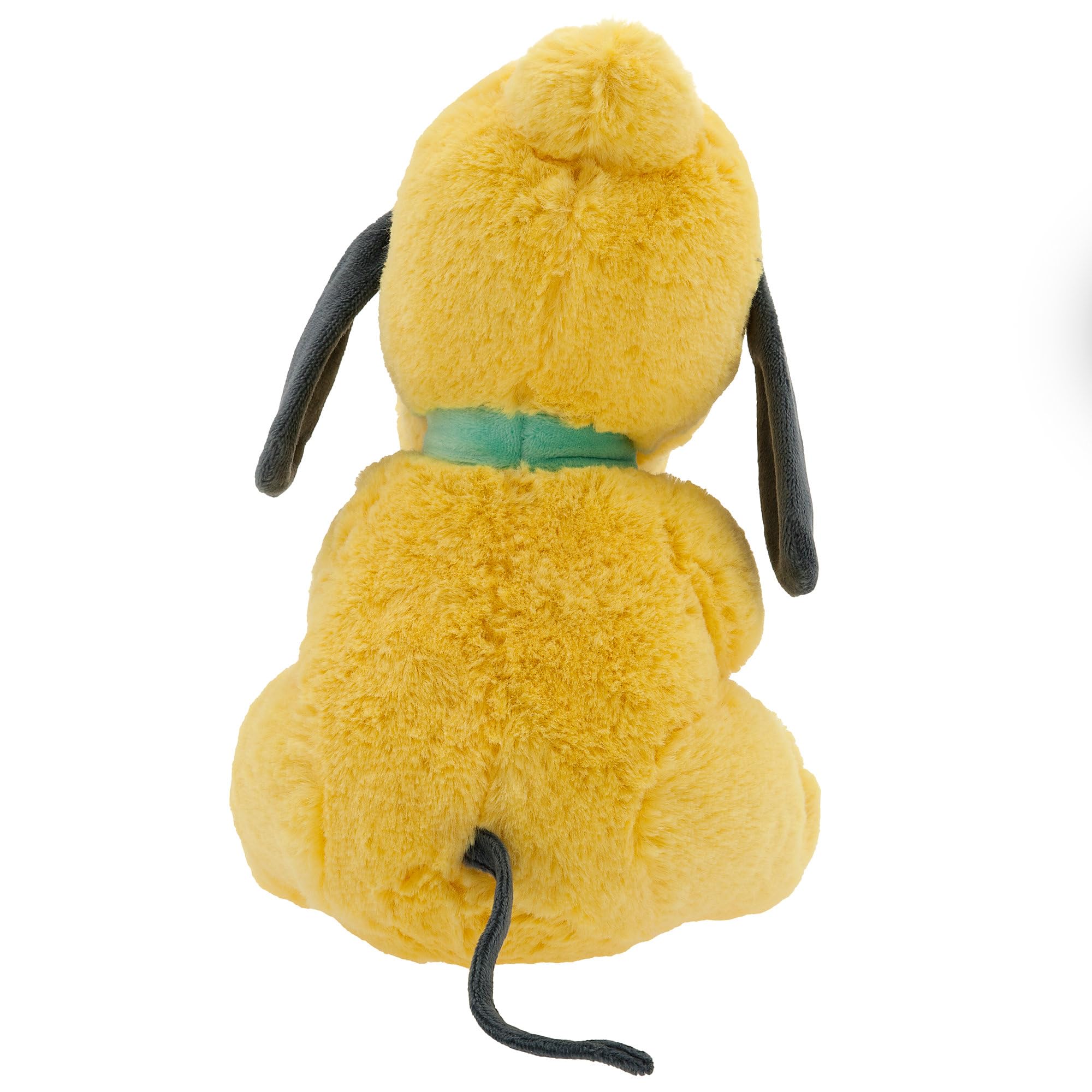 Disney Store Pluto plush at playtime shows a soft, huggable companion.