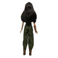 Disney Store Raya brush accessory helps tidy her long hair between sessions.