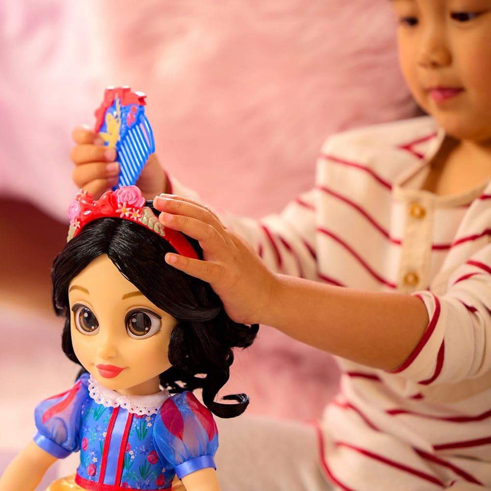 Disney Store Snow White deluxe satin dress with shimmering organza accents.