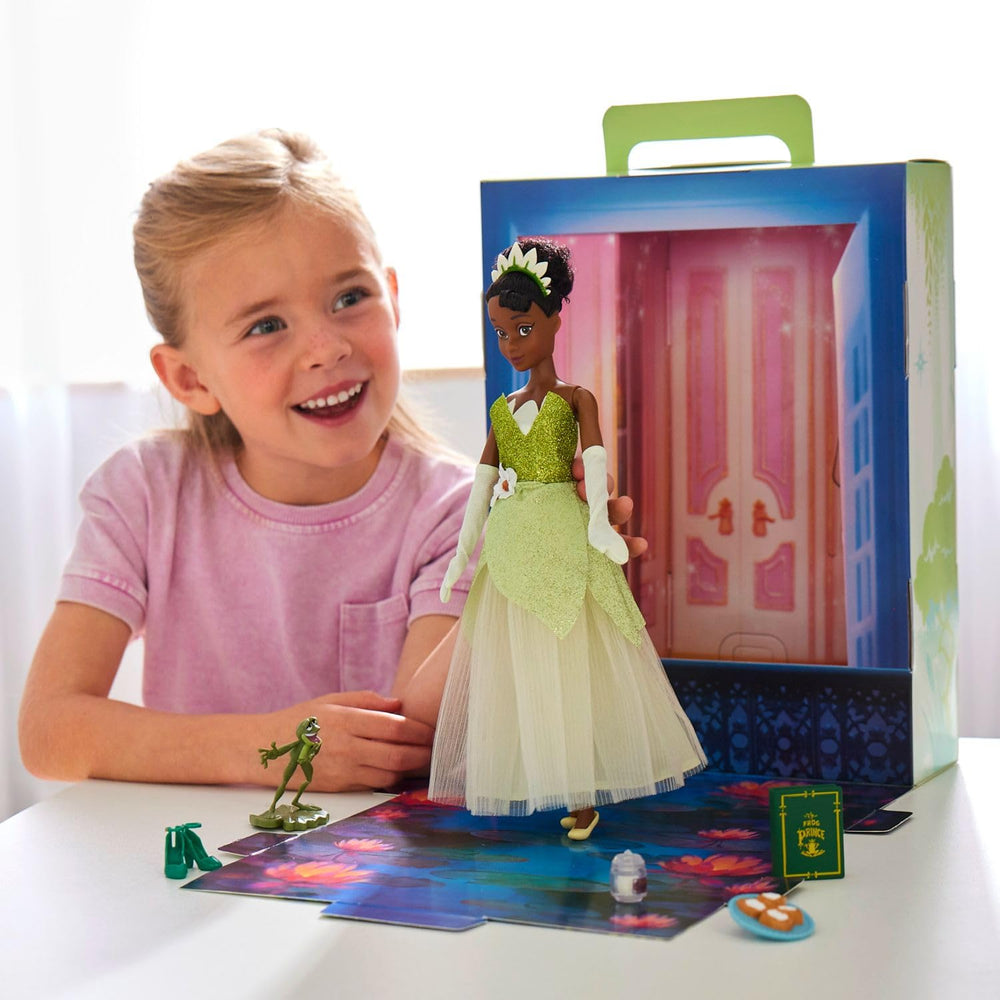 Disney Store Tiana doll with extra dress and shoes for dress-up adventures.